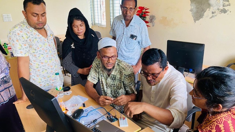 Teacher performing their task during the robotics session